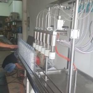 009.เครื่องบรรจุน้ำแถวตรง 6 หัว