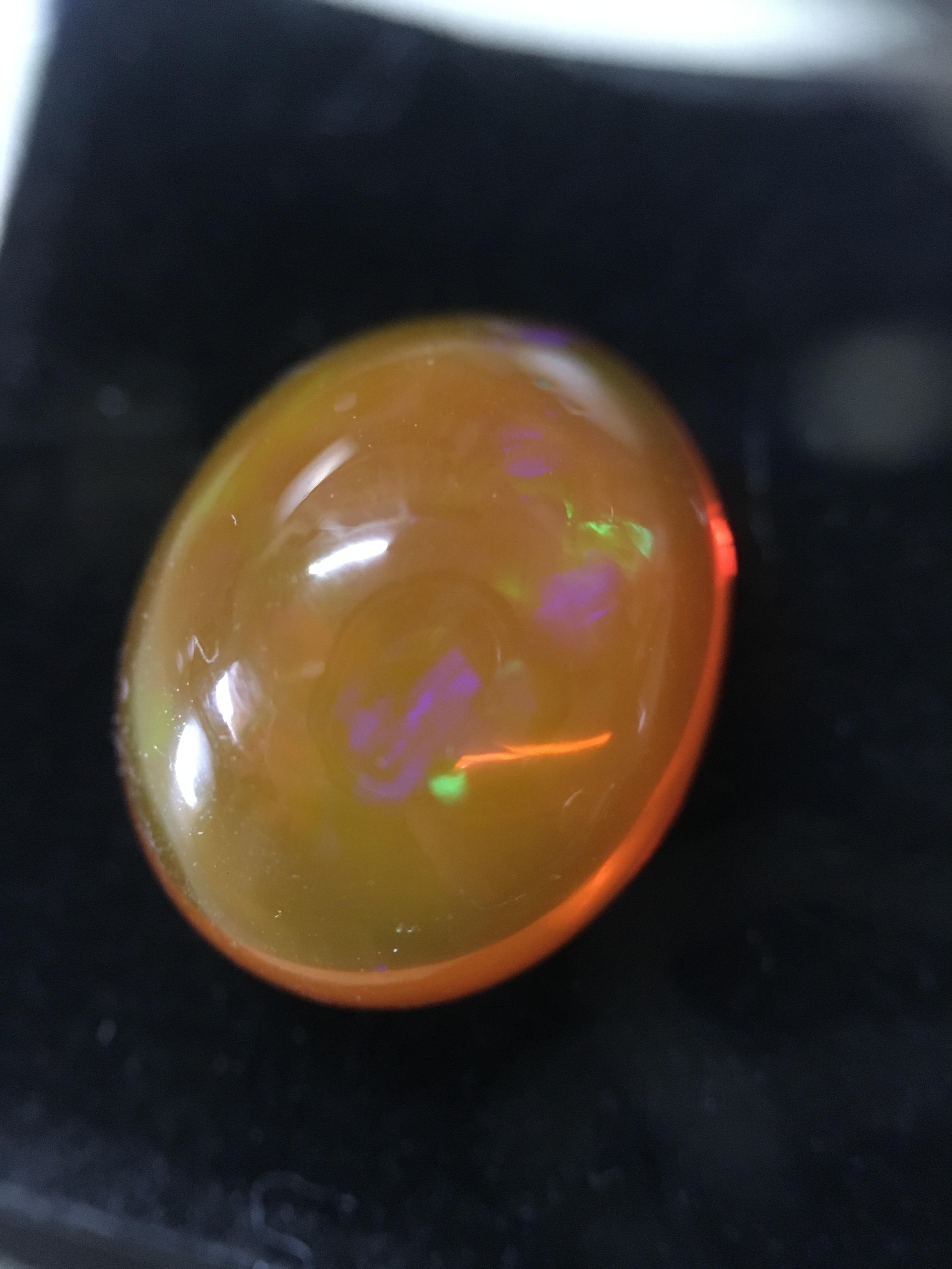 FIRE OPAL โอปอลไฟ แท้ 6.8 กะรัต ทรงไข่อ้วนๆ รุ้งหลากสี สวยธรรมชาติสร้าง