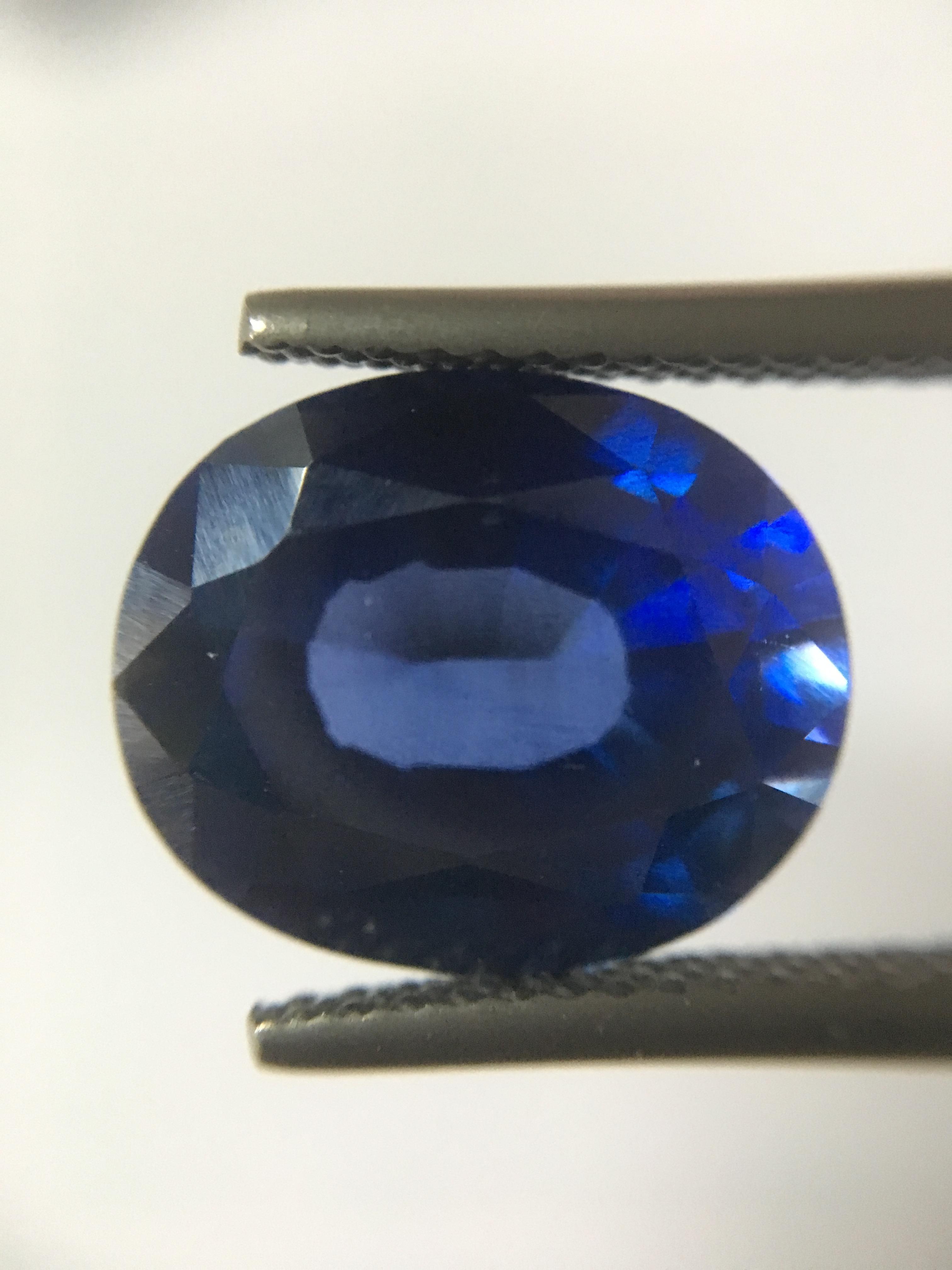 (พลอยโคลนนิ่ง สวยเหมือนยันเงา) ไพลินสังเคราะห์ 6.59 กะรัต เนื้อใส ไฟดี สีสวย เหมือนพลอยแท้ม๊ากก