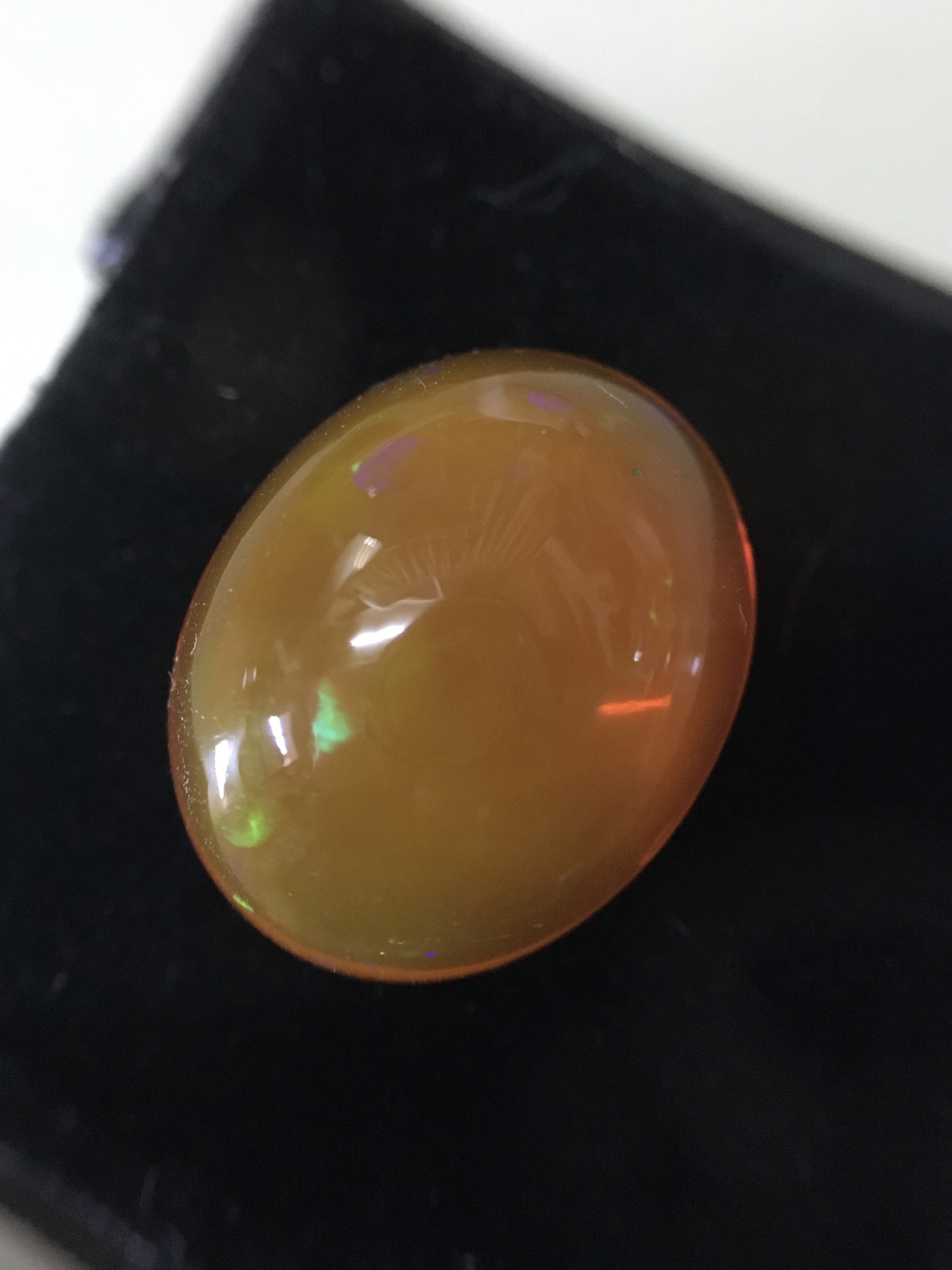 FIRE OPAL โอปอลไฟ แท้ 6.8 กะรัต ทรงไข่อ้วนๆ รุ้งหลากสี สวยธรรมชาติสร้าง