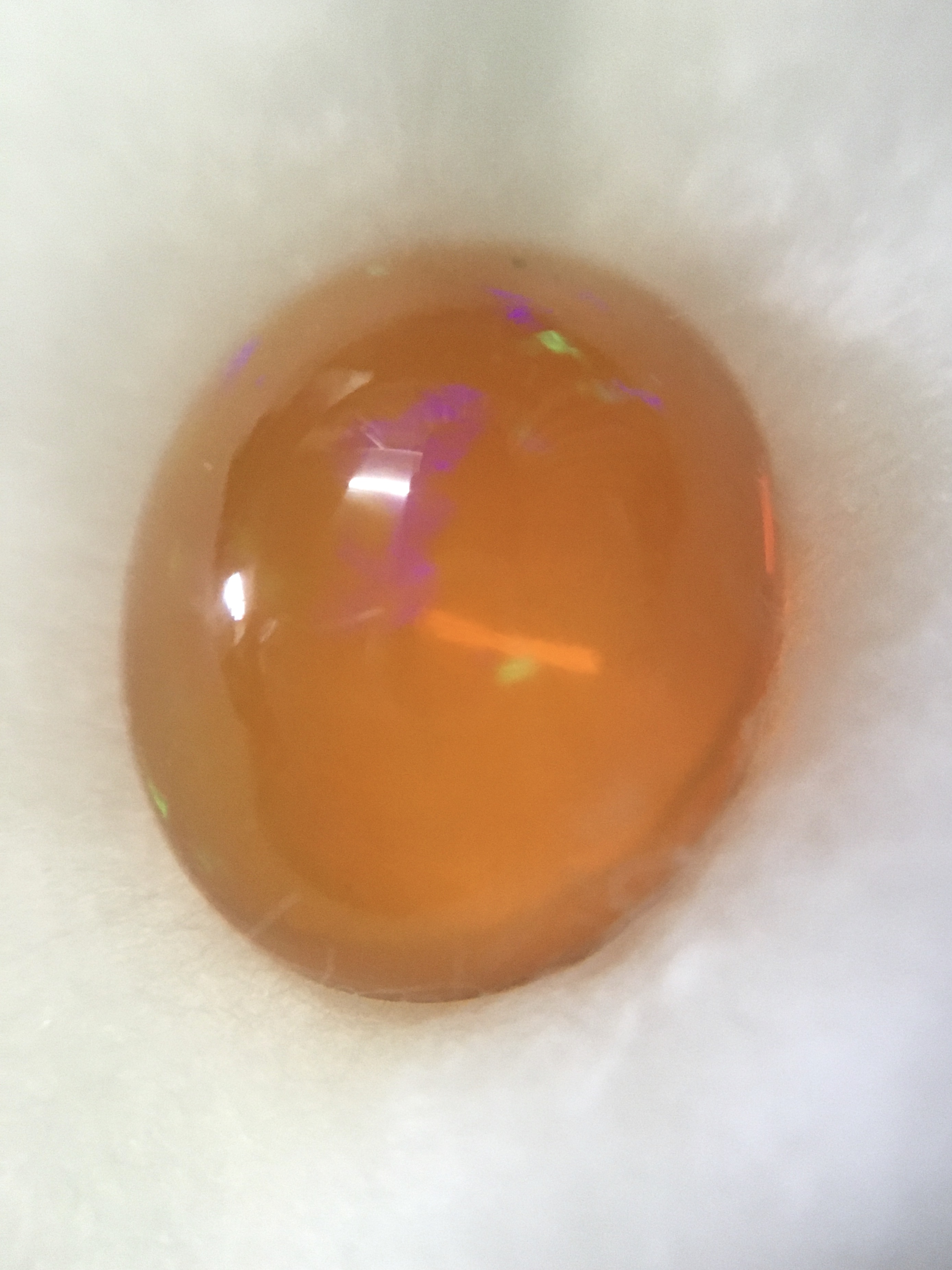 FIRE OPAL โอปอลไฟ แท้ 6.8 กะรัต ทรงไข่อ้วนๆ รุ้งหลากสี สวยธรรมชาติสร้าง