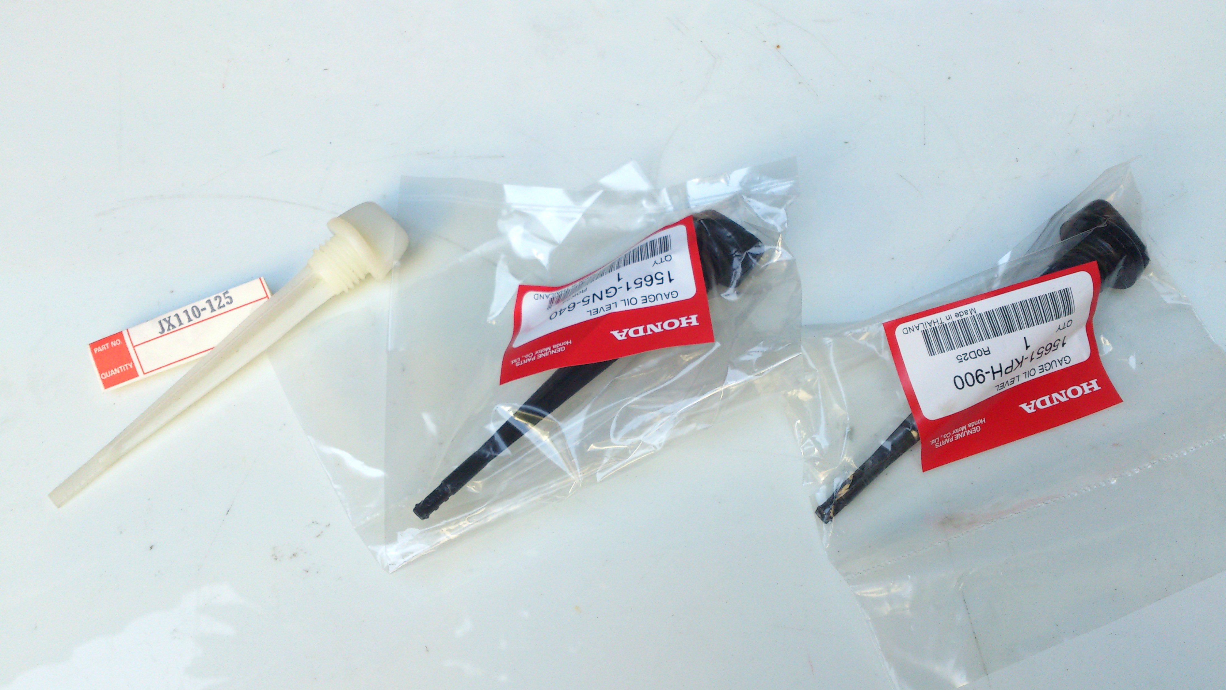 ก้านวัดระดับน้ำมันเครื่อง Honda CG/JX110 สีขาว Wave/Dream สีดำ
