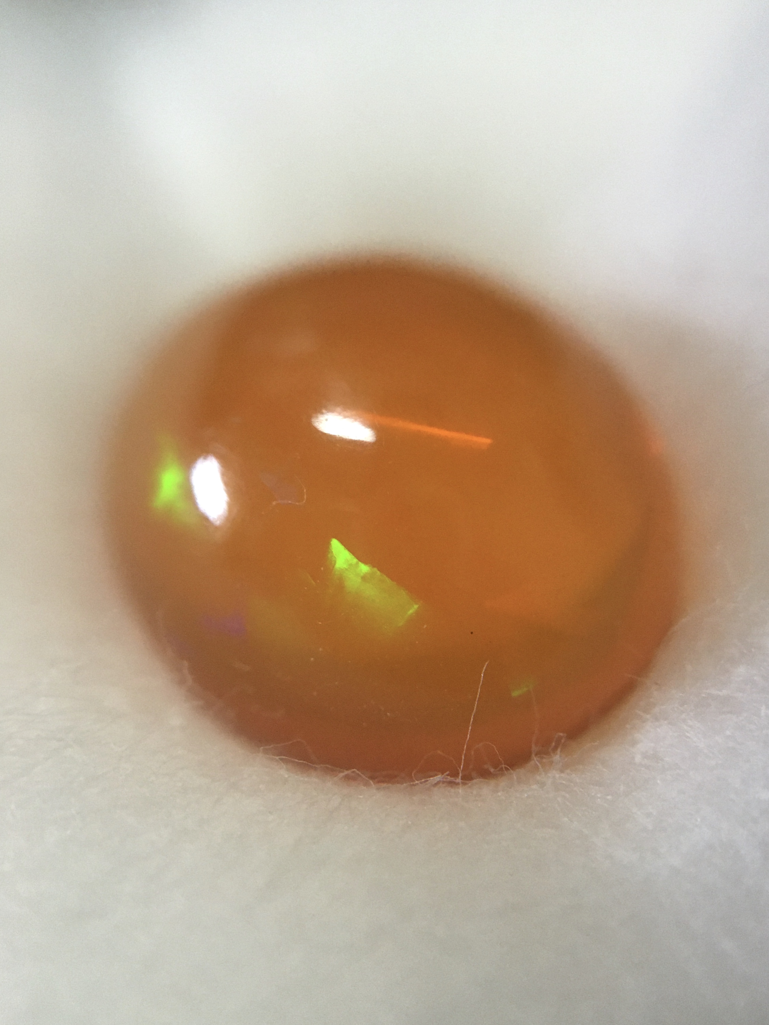 FIRE OPAL โอปอลไฟ แท้ 6.8 กะรัต ทรงไข่อ้วนๆ รุ้งหลากสี สวยธรรมชาติสร้าง